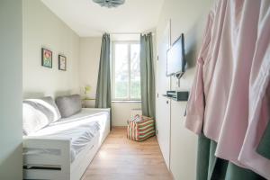 La Villa du Lac - Appartements de vacances - Les pieds dans l-eau : photos des chambres