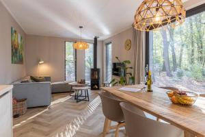 Boshuisje in Norg met panorama sauna