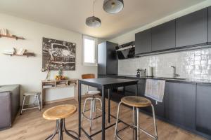 La Villa du Lac - Appartements de vacances - Les pieds dans l-eau : photos des chambres