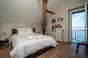 La Villa du Lac - Appartements de vacances - Les pieds dans l-eau : photos des chambres