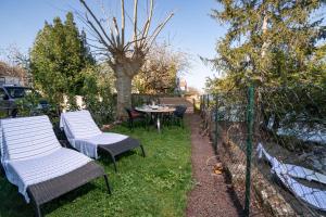 La Villa du Lac - Appartements de vacances - Les pieds dans l-eau : photos des chambres