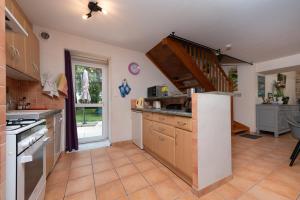 Appartements Chez nous : photos des chambres