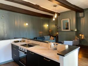 Appartements AppartCosy 08 Charme et Authenticite : photos des chambres