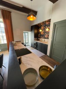 Appartements AppartCosy 08 Charme et Authenticite : photos des chambres