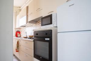 GuestHost - Comfy Apartment 500 mt from the Sea
