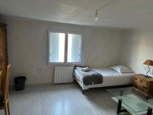 Sejours chez l'habitant 4 chambres privees dans un pavillon chaleureux : photos des chambres