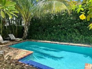 Casa Paradiso - A Sun Drenched Escape with Poolside Cabana Charm