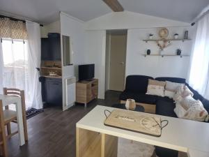 Campings Mobilhome chaleureux 8 couchages : photos des chambres
