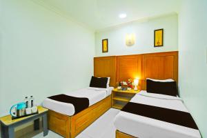 Collection O JLN Marg