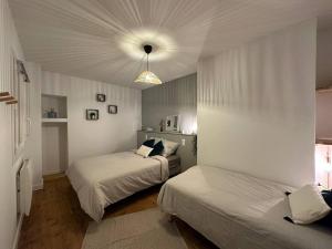 Appartements Charmant T2 - La Familia : photos des chambres