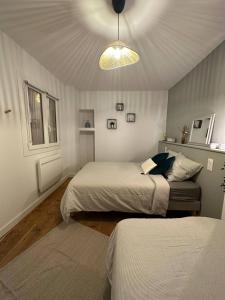 Appartements Charmant T2 - La Familia : photos des chambres