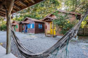 Cabanas relaxantes perto da Praia do Rosa - PRJ