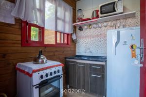 Cabanas relaxantes perto da Praia do Rosa - PRJ