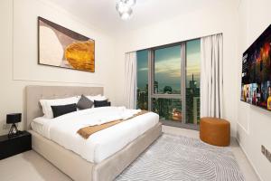 Luxury 2BR Sea View Walk to Burj & Dubai Mall