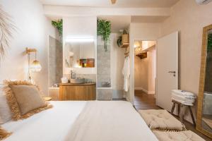 Appartements Le Jardin Secret - Suite Bali avec Balneo : photos des chambres
