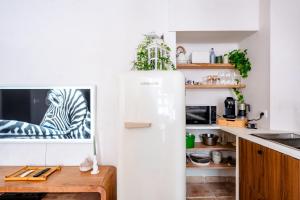 Appartements Le Jardin Secret - Suite Bali avec Balneo : photos des chambres