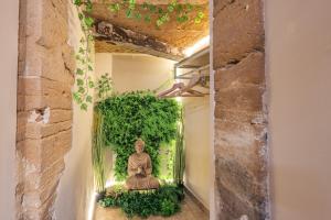 Appartements Le Jardin Secret - Suite Bali avec Balneo : photos des chambres