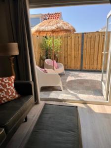 Beachhouse Noteboom, omheinde tuin