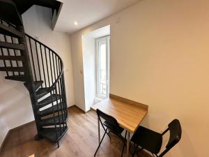 Appartements Place SAINT PAUL triplex 19m2 : photos des chambres