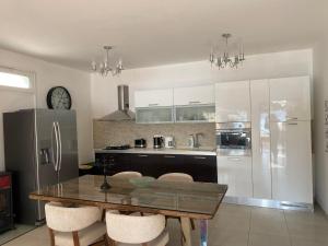 Toma - house by the sea