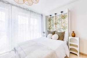 Appartements Green Mood - Design & Calme - Aux Portes de Paris : photos des chambres