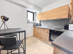 Appartements Charmant Duplex Avec Terrasse : photos des chambres