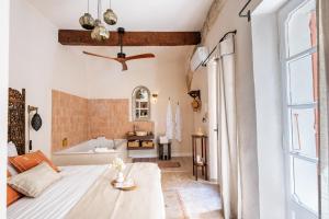 Appartements Le Jardin Secret - Suite Riad avec Balneo : photos des chambres