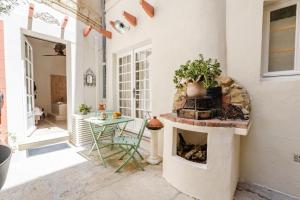 Appartements Le Jardin Secret - Suite Riad avec Balneo : photos des chambres