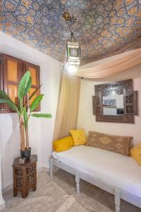 Appartements Le Jardin Secret - Suite Riad avec Balneo : photos des chambres