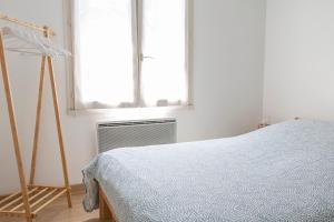 Appartements T4 - Charmant Appartement a Saint Aignan : photos des chambres