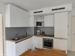 Appartements Gran Cap Apartment : photos des chambres