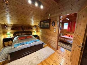 Wooden cottage with private pool near to sea