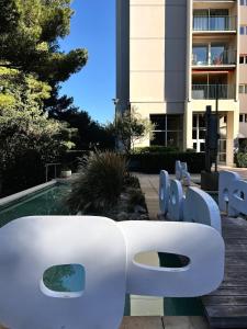 Villas Maison Californienne avec piscine proche de la mer : photos des chambres