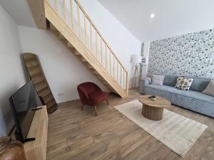 Appartements Au son de l-eau : photos des chambres