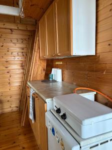 Traditional Finnish lakeside off-grid cabin