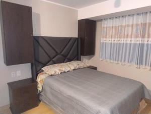 Depa con estacionamiento 3 dorm en Av Brasil