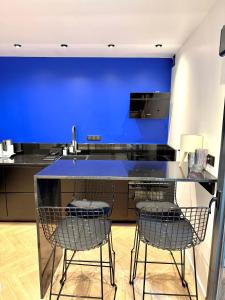 Appartements Sur les traces de Cyrano Duplex : photos des chambres