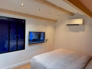 Appartements Sur les traces de Cyrano Duplex : photos des chambres