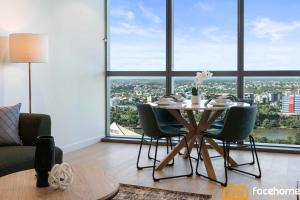 Elevated Luxury at QWR City & River Views