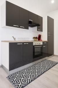 Appartements Le Vosgien - Hyper center - Calme - Wifi - Spacieux : photos des chambres