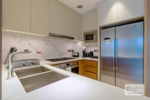Luxury 3BR Apartment with Burj Khalifa Views - Address Opera