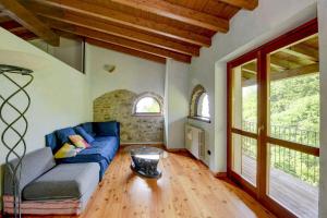 Loft panoramico a Tignale con giardino e parcheggio