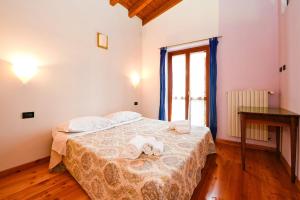 Loft panoramico a Tignale con giardino e parcheggio