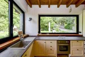 Loft panoramico a Tignale con giardino e parcheggio