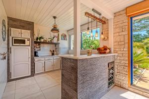 Maisons de vacances Maison avec spa a 700m de la plage : photos des chambres