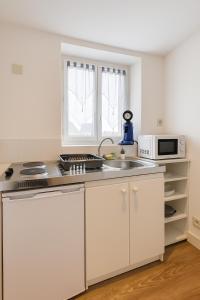 Appartements Le Cozy - Hyper centre - Calme - Moyenne duree : photos des chambres