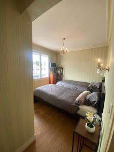 Maisons de vacances Grande Maison familiale 50m de la plage - Le nid d-Asnelles : photos des chambres
