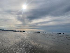 Maisons de vacances Grande Maison familiale 50m de la plage - Le nid d-Asnelles : photos des chambres