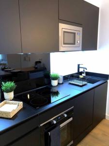 Appartements Le Floral - Parking prive - Climatisation : photos des chambres