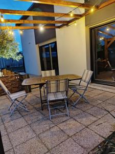 Maisons de vacances Maison recente avec jardin. : photos des chambres